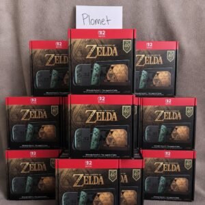 Nintendo Switch 2 Zelda 40th Anniversary Edition console boxes arranged beneath a handwritten Plomet sign